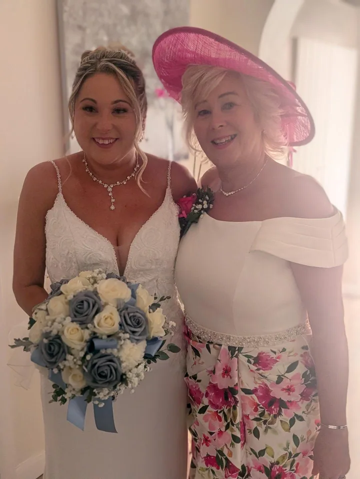 A bride and her mother with hair styled by Becky