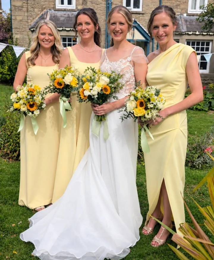 Chloe and her bridal party in their finished wedding outfits.