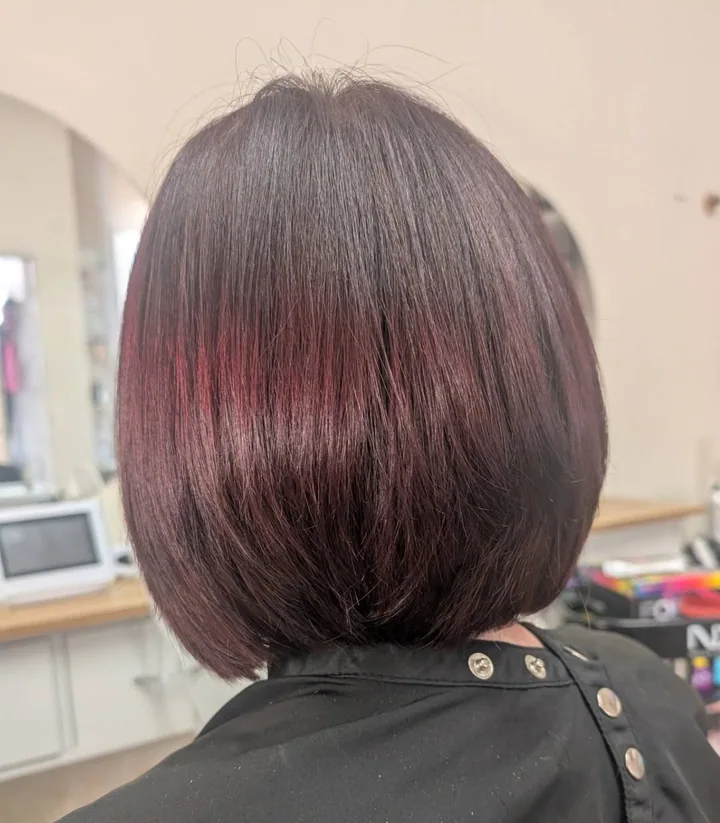 A finished burgundy bob haircut from Mortimer Hair House